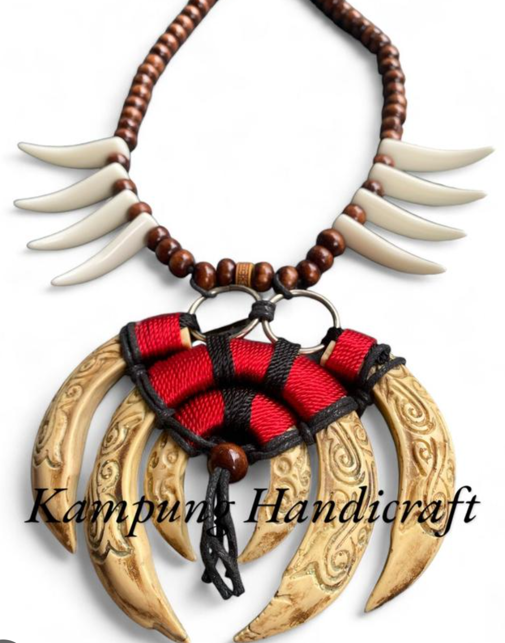 kalung taring babi